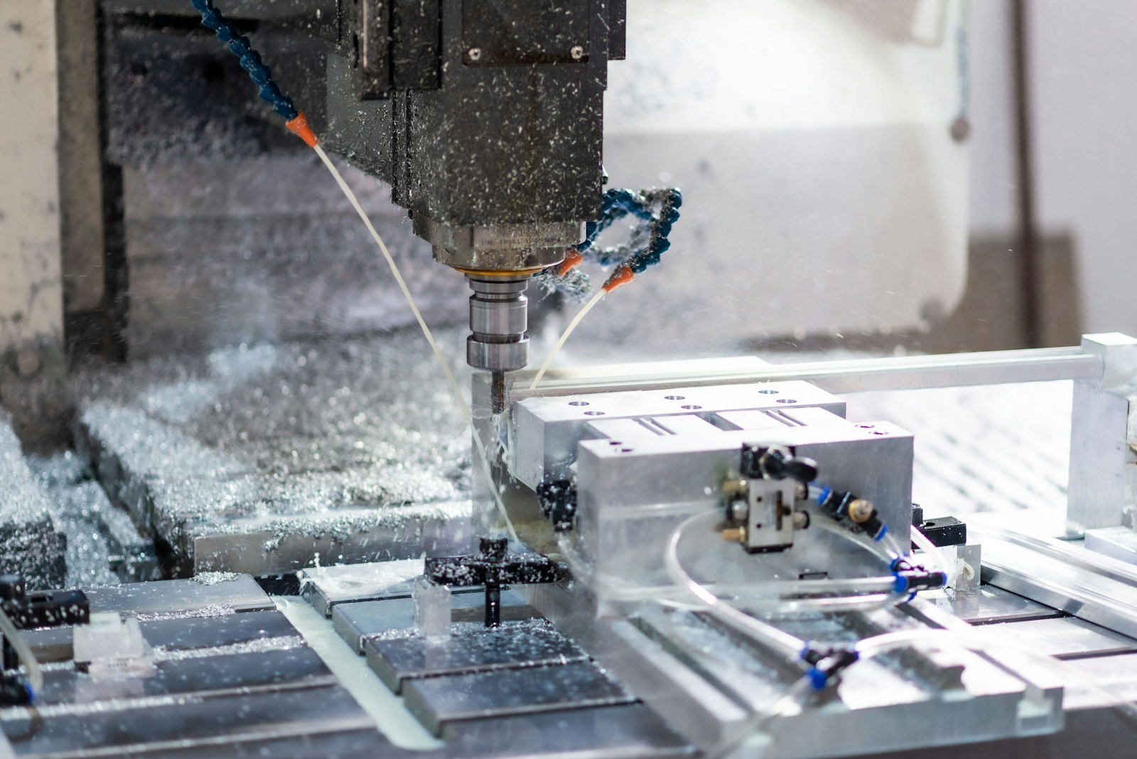 Manufacturing Business Loans &Amp; Equipment Financing 1 Cnc machining center cutting a metal part with coolant